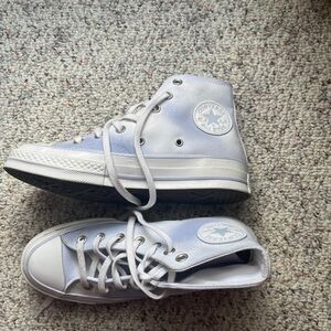 Like new converse sz 7. Only worn twice. They are a light lavender tie dye
